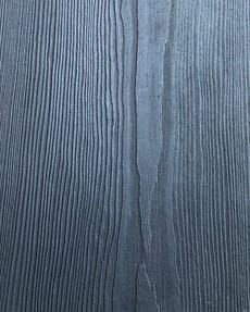 Wire-brushed wood finish in charred black