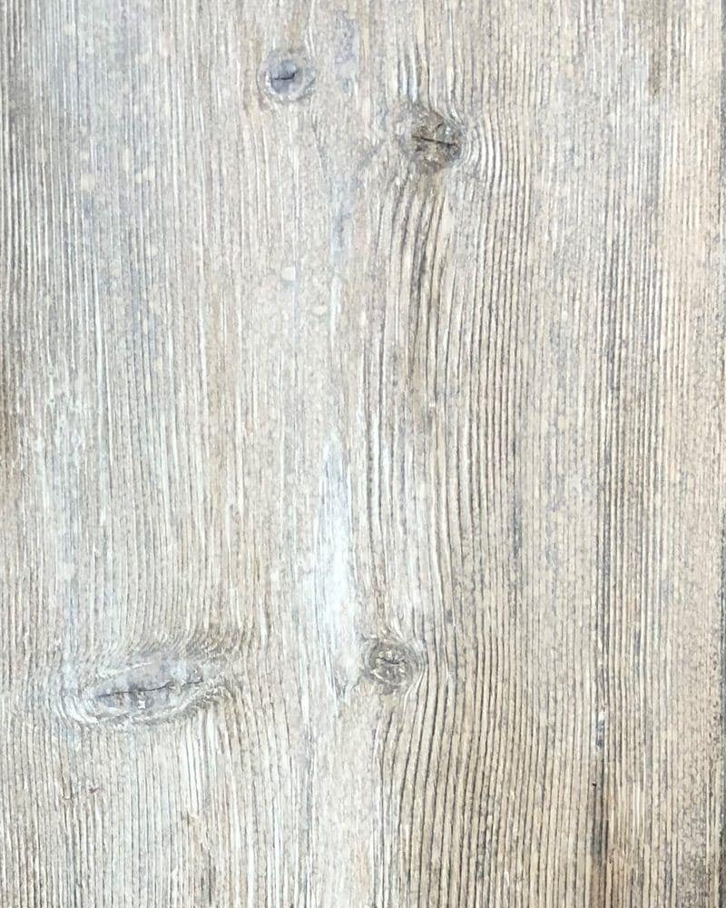 Wire-brushed wood finish in old barn